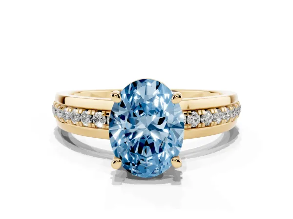Fancy Blue Oval Cut Solitaire Diamond Ring with Channel Set Band and Six-Prong Setting Yellow gold