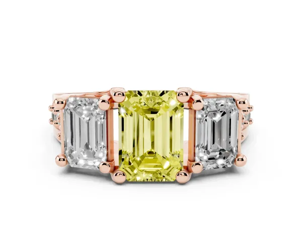 Fancy Yellow Emerald Cut Diamond Three-Stone Ring with Channel Set Band and Four-Prong Setting Rose gold