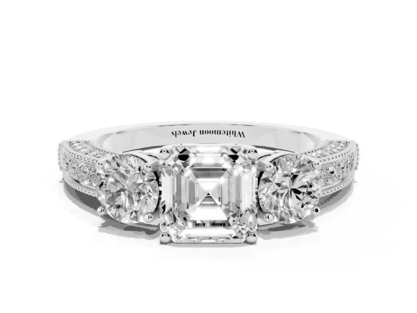 Asscher Cut Three-Stone Diamond Ring with Pavé Band and Four-Prong Setting Platinum