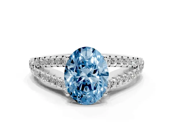 Fancy Blue Oval Cut Diamond Split Shank Pavé Engagement Ring with Four-Prong Setting White gold