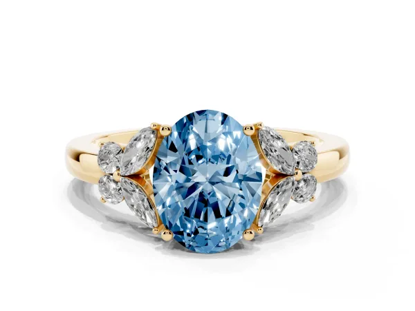 Fancy Blue Oval Cut Cut Solitaire Floral Diamond Ring with Four-Prong Setting Yellow gold