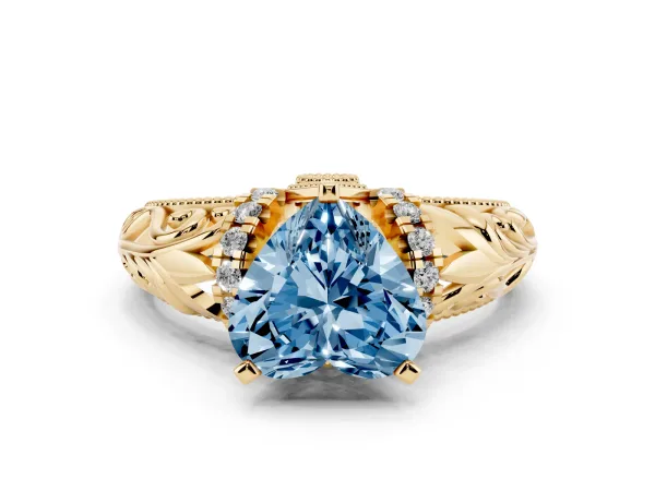 Fancy Blue Heart Cut Solitaire Filigree Engagement Ring with Halo and Prong Setting Yellow gold