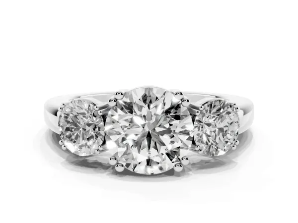 Three-Stone Round Cut Cut Diamond Ring with Channel Set Band and Four-Prong Setting Platinum