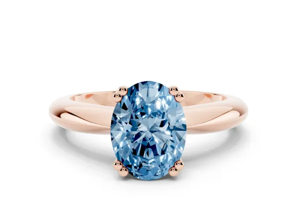 Fancy Blue Oval Cut Cut Solitaire Engagement Ring with Tapered Band and Four-Prong Setting Rose gold