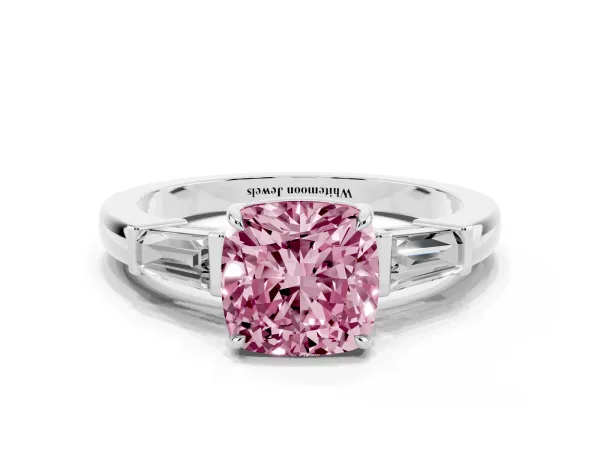 Fancy Pink Cushion Cut Diamond Three-Stone Ring with Tapered Baguette Side Stones and Prong Setting Platinum