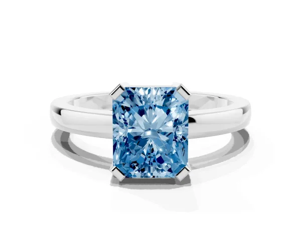 Fancy Blue Radiant Cut Cut Solitaire Ring with Four-Prong Setting and Classic Band Platinum