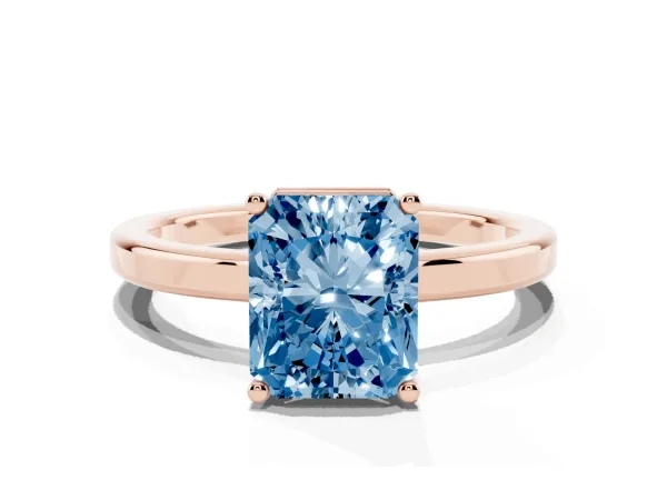 Fancy Blue Radiant Cut Cut Solitaire Engagement Ring with Four-Prong Setting on a Classic Band Rose gold