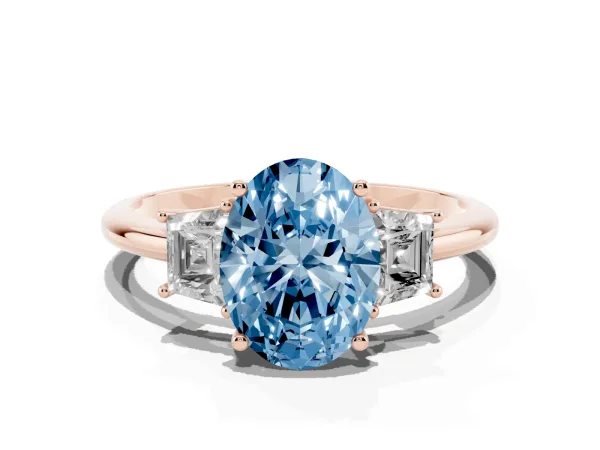 Fancy Blue Oval Cut Diamond Three-Stone Ring with Trapezoid Side Stones and Prong Setting Rose gold
