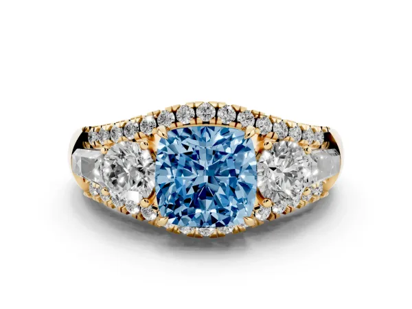 Fancy Blue Three-Stone Cushion Cut Diamond Engagement Ring with Pave Band and Prong Setting Yellow gold