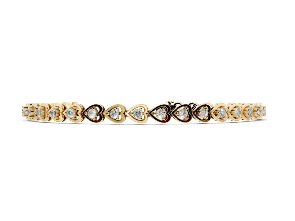 Heart-Shaped Diamond Tennis Bracelet with Channel Setting and Four-Prong Setting Yellow gold
