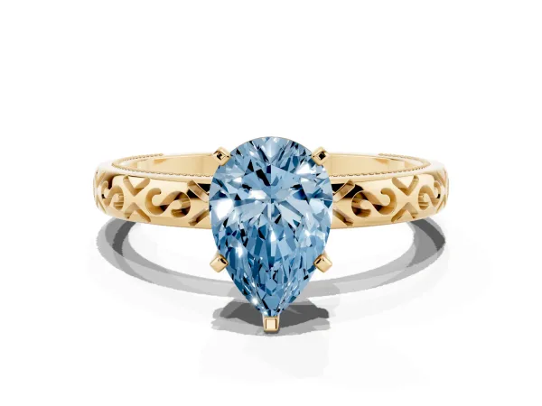 Fancy Blue Pear Cut Solitaire Engagement Ring with Scrollwork Band and Four-Prong Setting Yellow gold