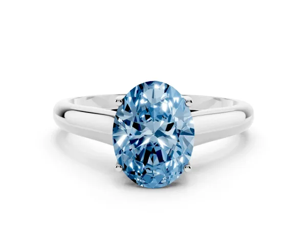 Fancy Blue Oval Cut Solitaire Engagement Ring with Tapered Band and Four-Prong Setting White gold