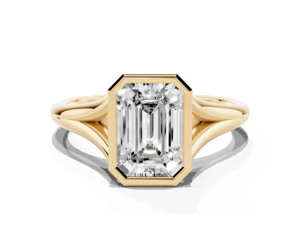 Bezel Set Emerald Cut Cut Solitaire Ring with Tapered Band Yellow gold