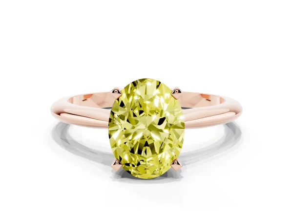 Fancy Yellow Oval Cut Cut Solitaire Ring with Four-Prong Setting on a Classic Band Rose gold