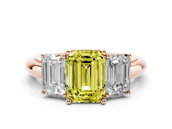 Fancy Yellow Three-Stone Emerald Cut Cut Diamond Engagement Ring with Prong Setting on a White Gold Band Rose gold