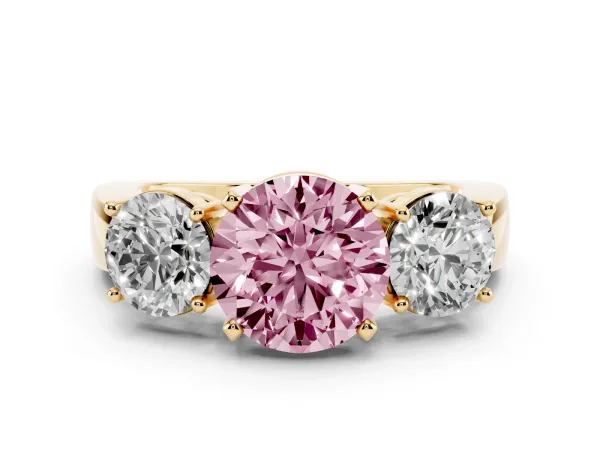 Fancy Pink Three-Stone Round Cut Diamond Ring with Round Side Stones, Classic Band, and Four-Prong Setting Yellow gold