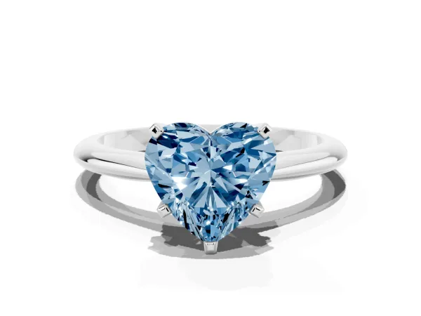Fancy Blue Heart Cut Cut Solitaire Ring with Four-Prong Setting on a Classic Band Platinum