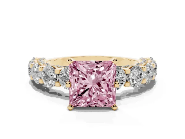 Fancy Pink Princess Cut Diamond Side Stone Engagement Ring with Four-Prong Setting Yellow gold