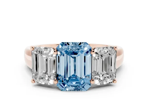 Fancy Blue Emerald Cut Three-Stone Diamond Ring with Prong Setting on a Classic Band Rose gold