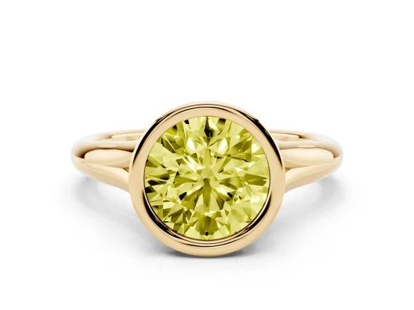 Fancy Yellow Bezel Set Round Cut Solitaire Diamond Ring with Smooth Band Yellow gold