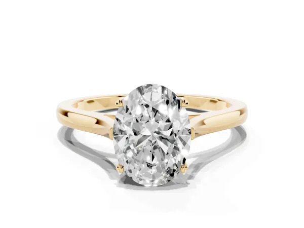 Oval Cut Solitaire Heart Prong Engagement Ring with Tapered Band Yellow gold