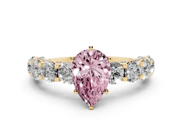 Fancy Pink Pear Cut Diamond Side Stone Engagement Ring with Four-Prong Setting Yellow gold