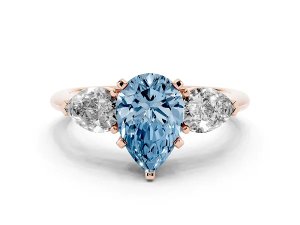 Fancy Blue Three-Stone Pear Cut Diamond Ring with Pear Side Stones and Four-Prong Setting Rose gold