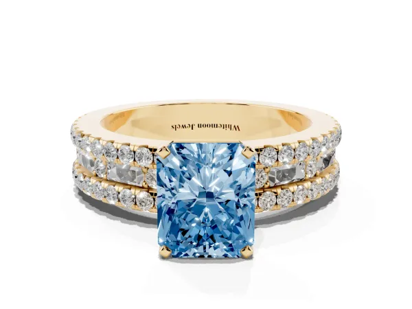 Fancy Blue Radiant Cut Diamond Solitaire Ring with Pavé and Channel Set Band Yellow gold