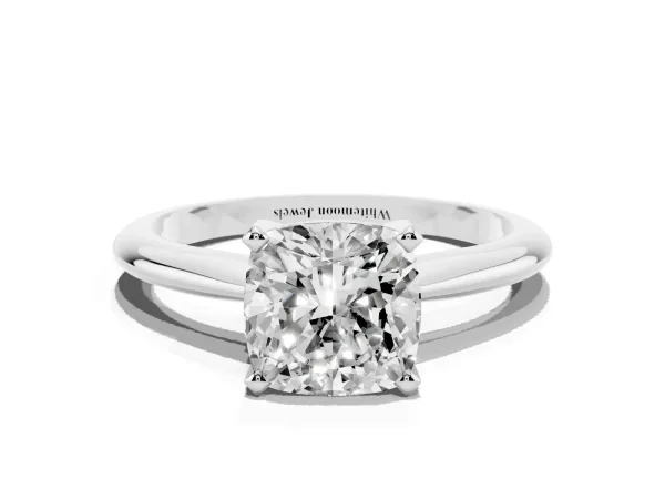 Cushion Cut Cut Solitaire Ring with Four-Prong Setting on a Classic Band White gold