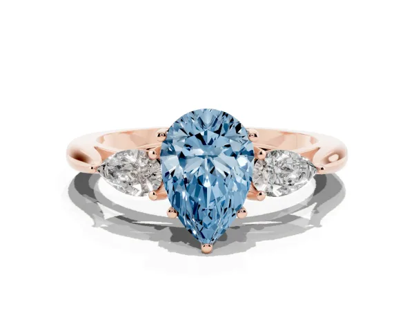 Fancy Blue Three-Stone Pear Cut Brilliant Diamond Solitaire Ring with Tapered Band and Four-Prong Setting Rose gold