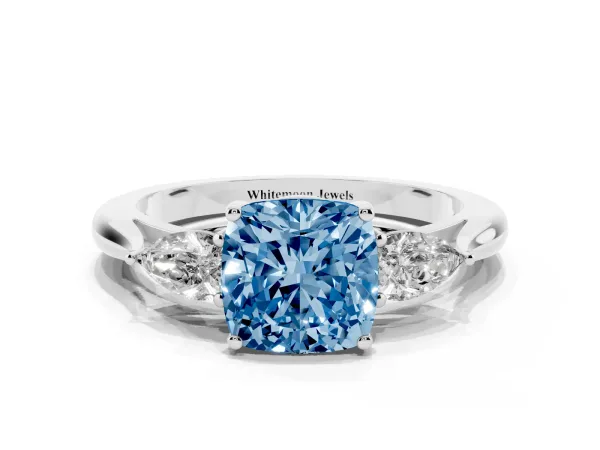 Fancy Blue Three-Stone Cushion Cut Brilliant Diamond Solitaire Ring with Tapered Band and Four-Prong Setting White gold
