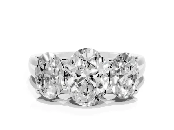 Oval Cut Three-Stone Diamond Ring with Prong Setting on a Classic Band White gold