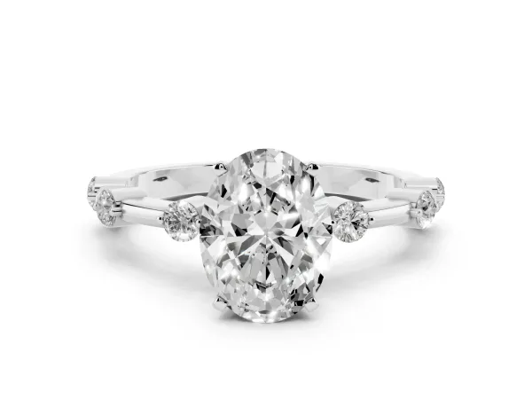 Oval Cut Solitaire Diamond Ring with Bezel Set Side Stones and Prong Setting White gold