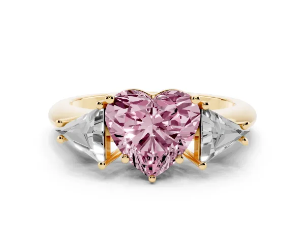 Fancy Pink Three-Stone Heart Cut Diamond Engagement Ring with Trillion Side Stones and Prong Setting Yellow gold
