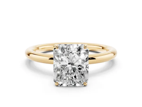 Radiant Cut Solitaire Diamond Ring with Four-Prong Setting on a Plain Band Yellow gold