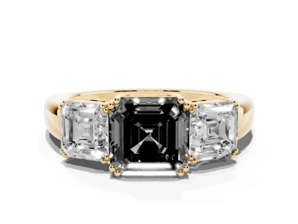 Fancy Black Three-Stone Asscher Cut Cut Diamond Ring with Channel Set Band and Four-Prong Setting Yellow gold