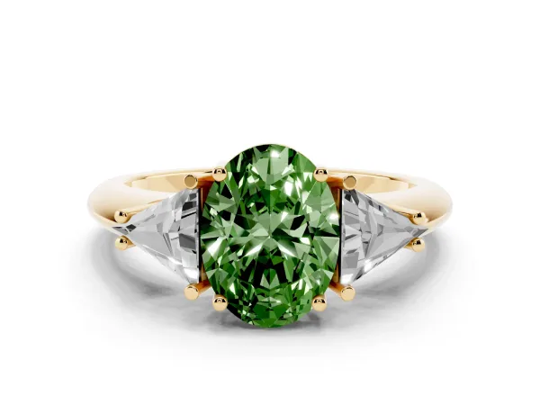 Fancy Green Three-Stone Oval Cut Diamond Engagement Ring with Trillion Side Stones and Prong Setting Yellow gold