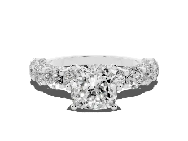 Cushion Cut Diamond Side Stone Engagement Ring with Four-Prong Setting Platinum