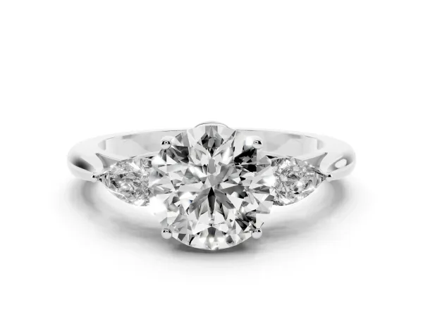 Three-Stone Round Cut Brilliant Diamond Solitaire Ring with Tapered Band and Four-Prong Setting White gold