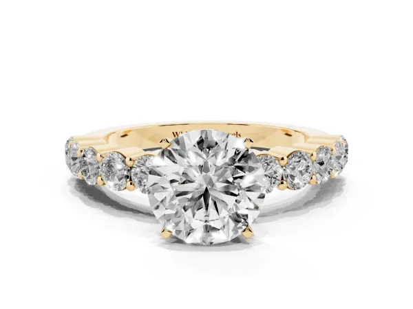 Round Cut Diamond Solitaire Ring with Shared Prong Round Side Stones Yellow gold