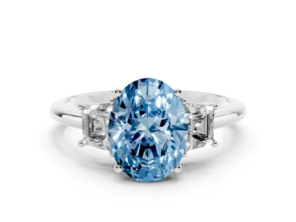 Fancy Blue Oval Cut Diamond Three-Stone Ring with Trapezoid Side Stones and Prong Setting Platinum