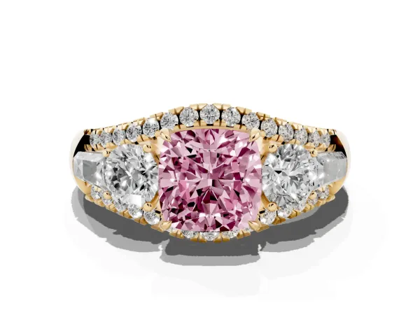 Fancy Pink Three-Stone Cushion Cut Diamond Engagement Ring with Pave Band and Prong Setting Yellow gold