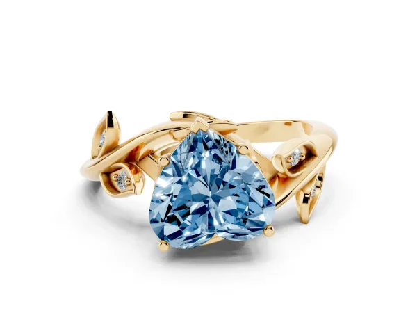 Fancy Blue Heart Cut Solitaire Twist Engagement Ring with Leaf Accents and Prong Setting Yellow gold