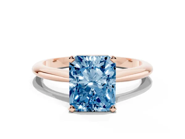 Fancy Blue Radiant Cut Cut Solitaire Ring with Four-Prong Setting on a Classic Band Rose gold