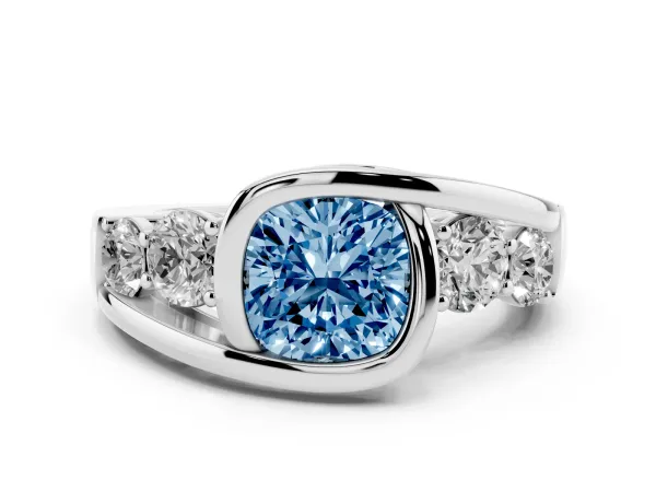 Fancy Blue Bezel Set Cushion Cut Diamond Bypass Ring with Round Accents Platinum