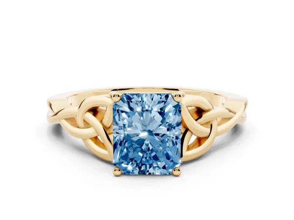 Fancy Blue Radiant Cut Diamond Solitaire Engagement Ring with Celtic Knot Band and Four-Prong Setting Yellow gold