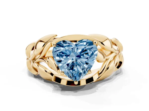 Fancy Blue Heart Cut Diamond Leaf-Inspired Engagement Ring with Round Accents and Prong Setting Yellow gold