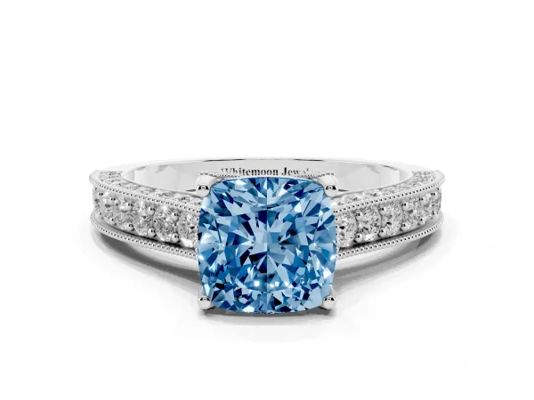 Fancy Blue Cushion Cut Cut Diamond Solitaire Ring with Milgrain Pave Band and Four Prong Setting Platinum