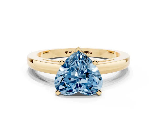 Fancy Blue Heart Cut Solitaire Diamond Engagement Ring with Four-Prong Setting on a Classic Band Yellow gold