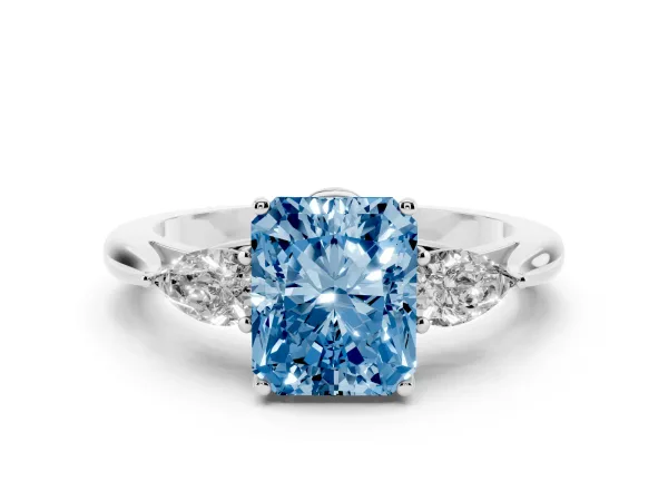 Fancy Blue Three-Stone Radiant Cut Diamond Ring with Pear Side Stones in Four-Prong Setting Platinum